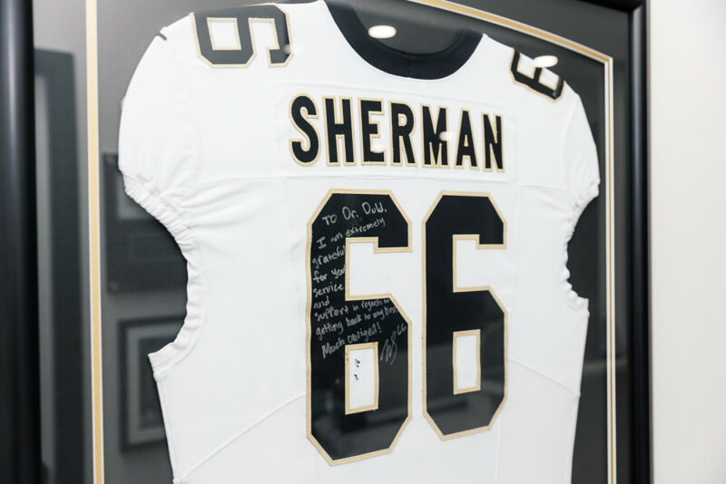 Signed New Orleans Saints jersey with a note to Dr. Dold