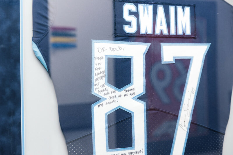 Signed Tennessee Titans jersey with a note to Dr. Dold